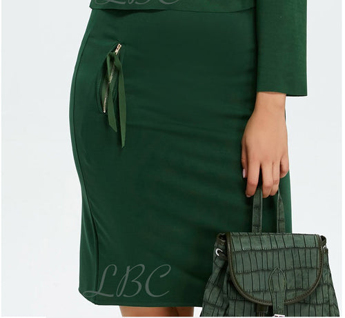 Green knit mini skirt w/decorative zips and raw edges